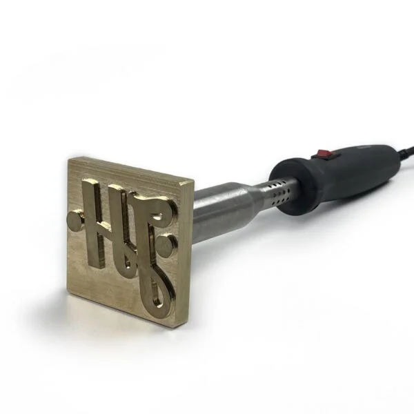 Electric branding iron fitted with a UK plug